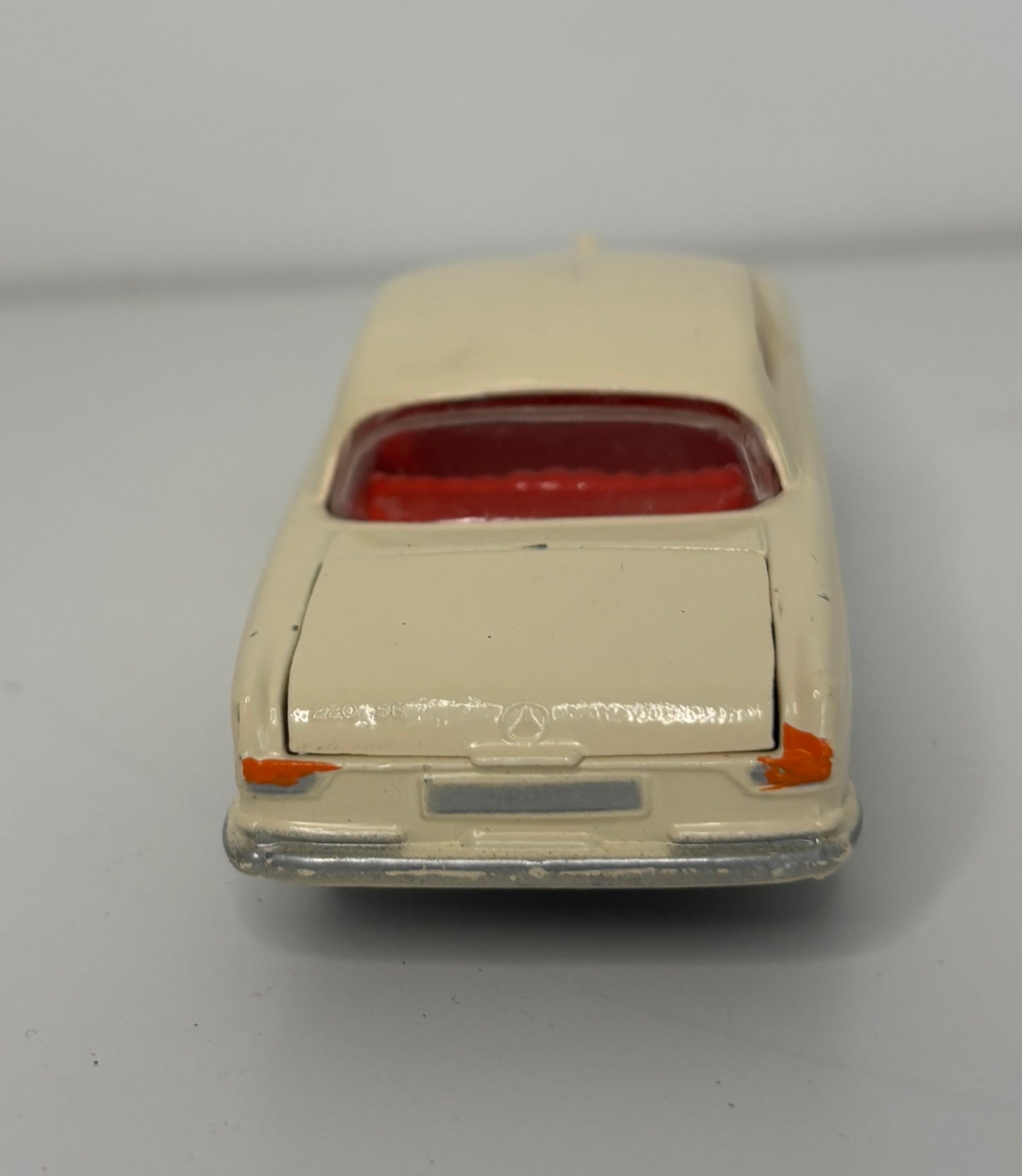 Model car on a gray background