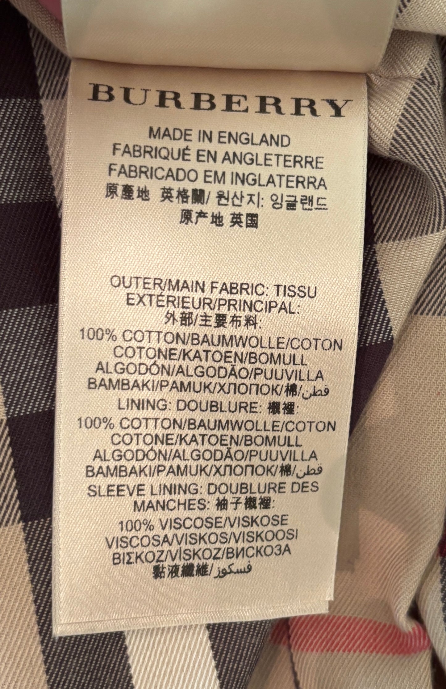 Burberry label on a checkered fabric background