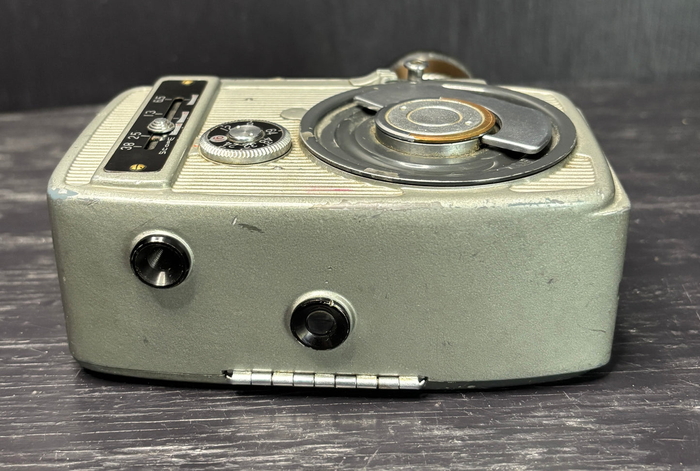 Vintage camera on a wooden surface