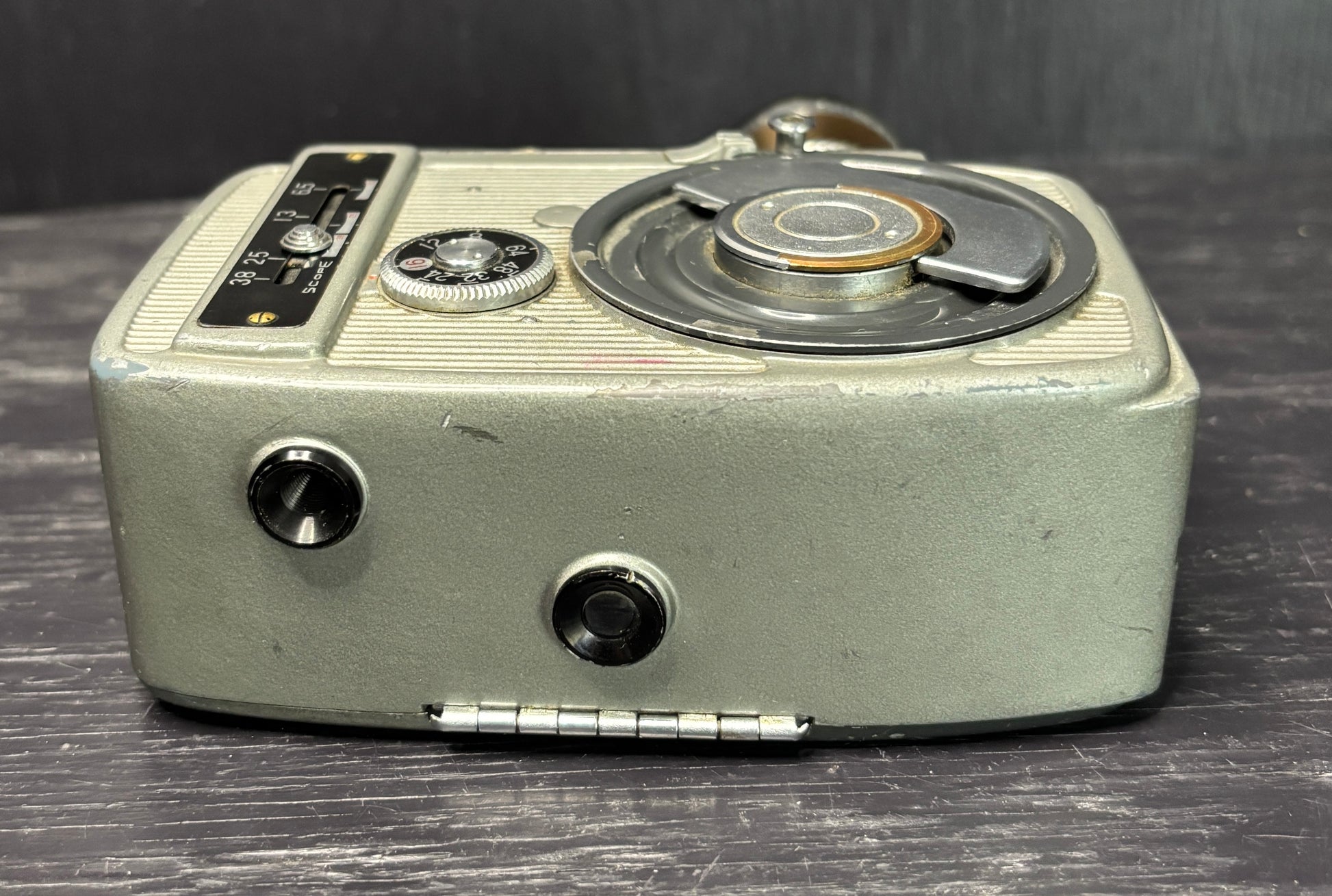 Vintage camera on a wooden surface