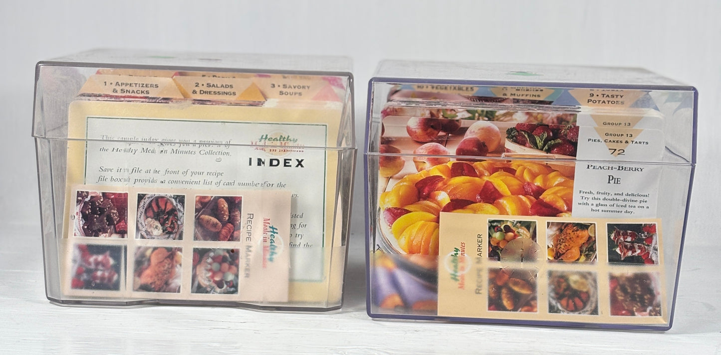 Two clear plastic card holders with food images and text on a white background