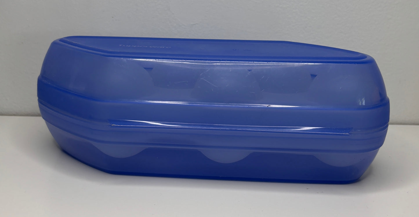 Blue plastic container with a lid on a white background