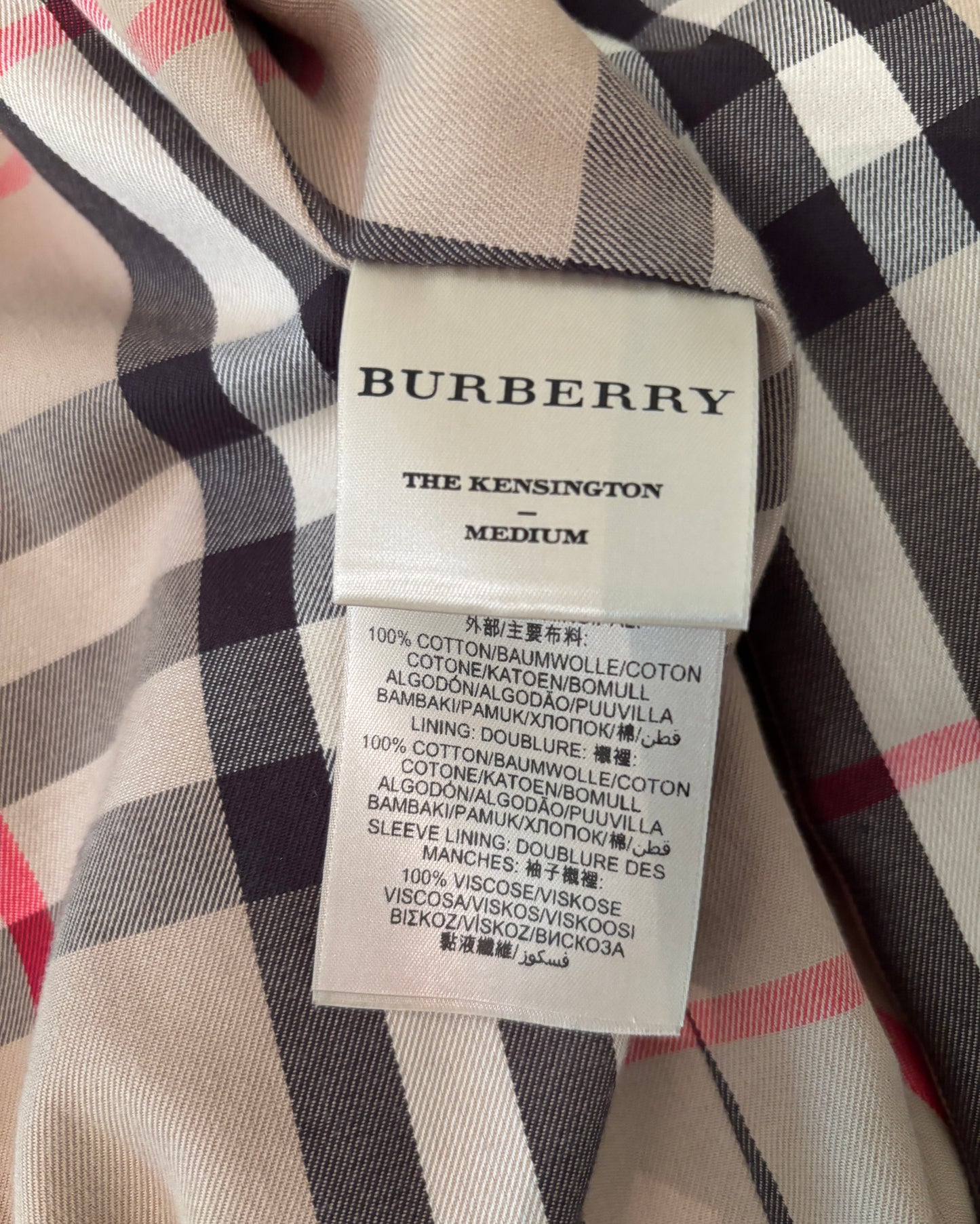 Burberry label on a checkered fabric background