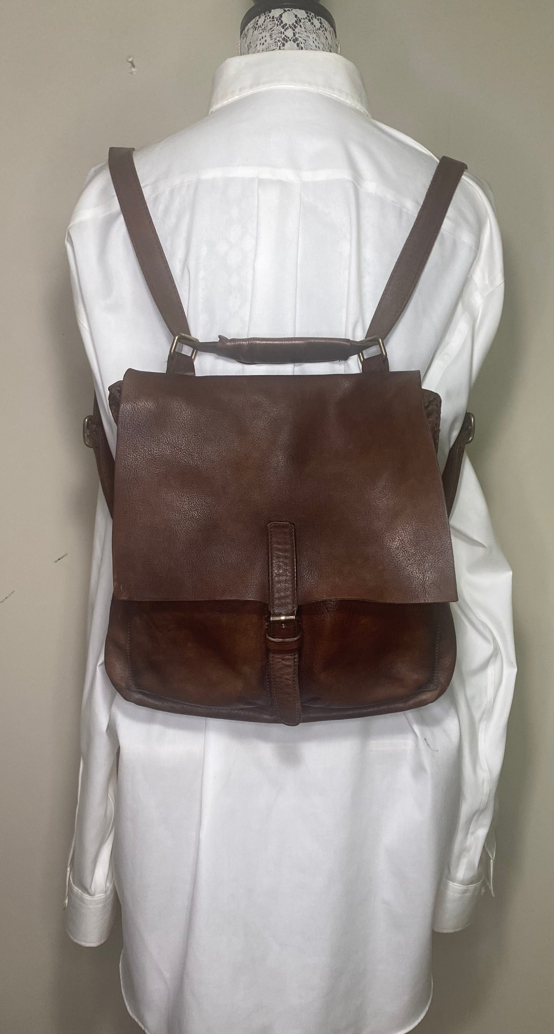 Roots leather backpack sale