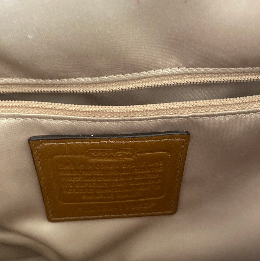 brown and beige Coach Signature Purse