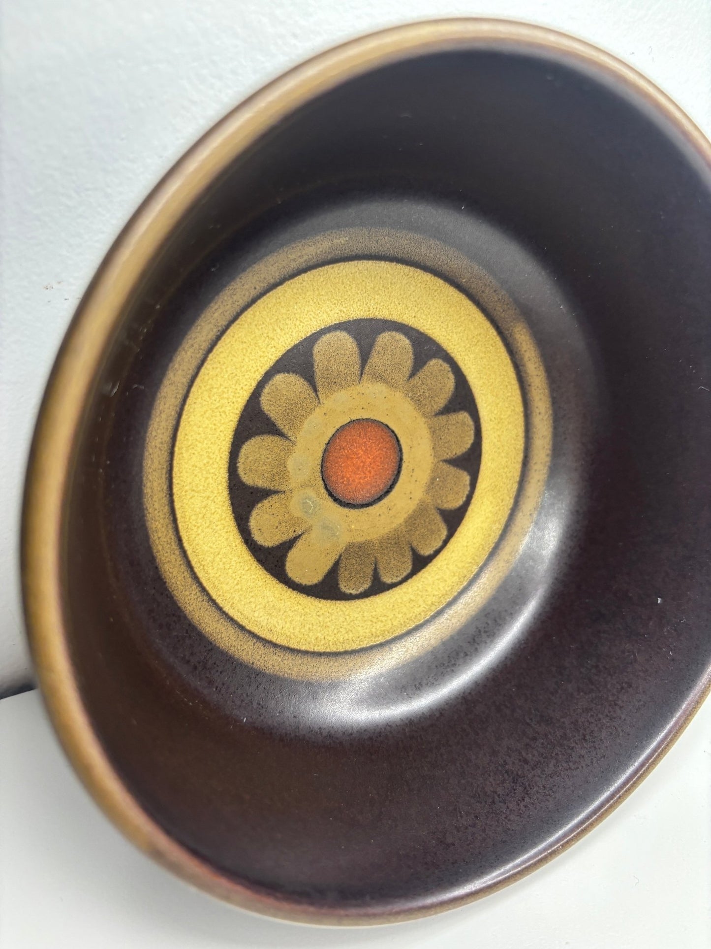 Ceramic bowl with floral design on a white background