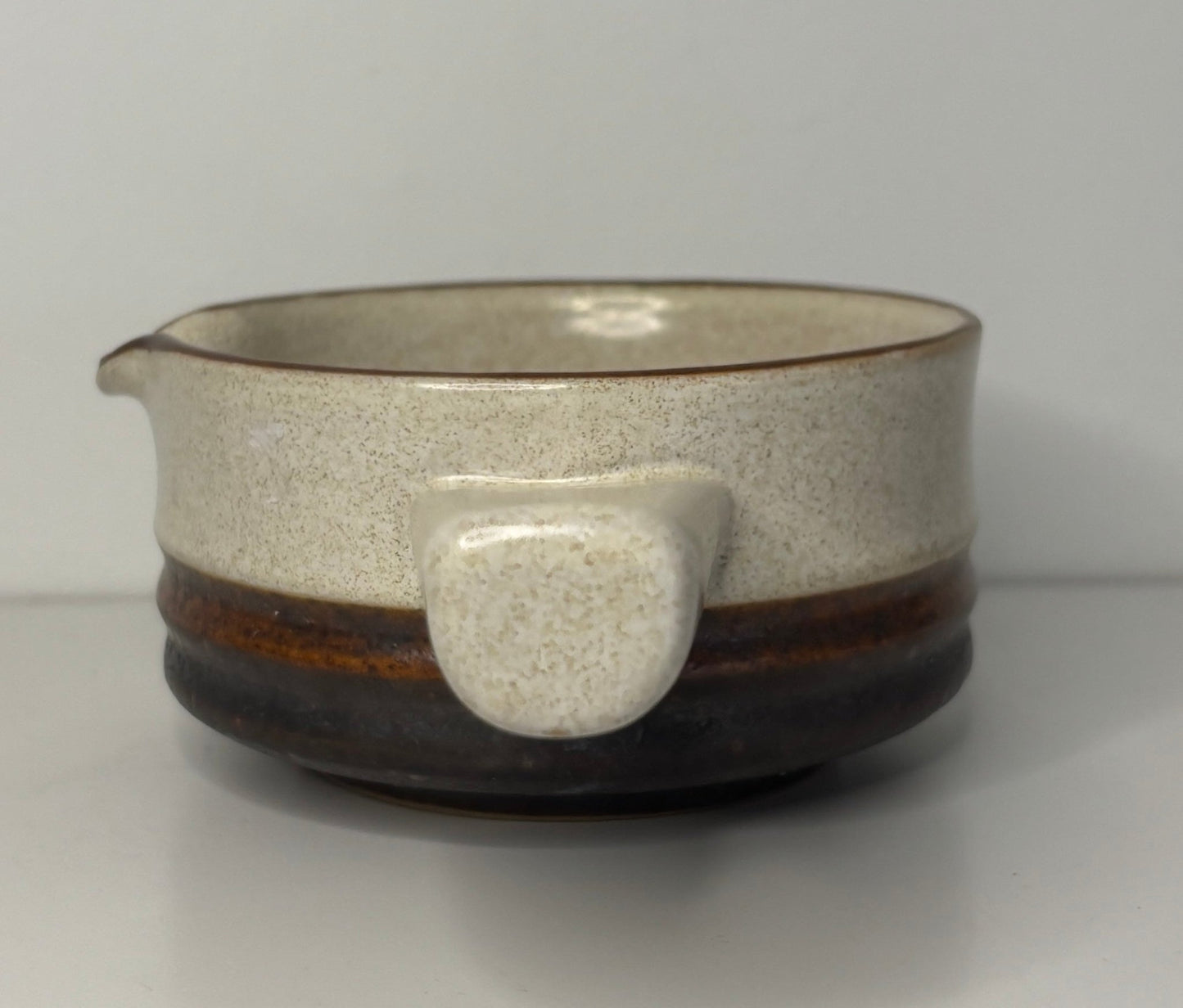 Denby Potters Wheel Gravy Boat with brown trim and long hanle