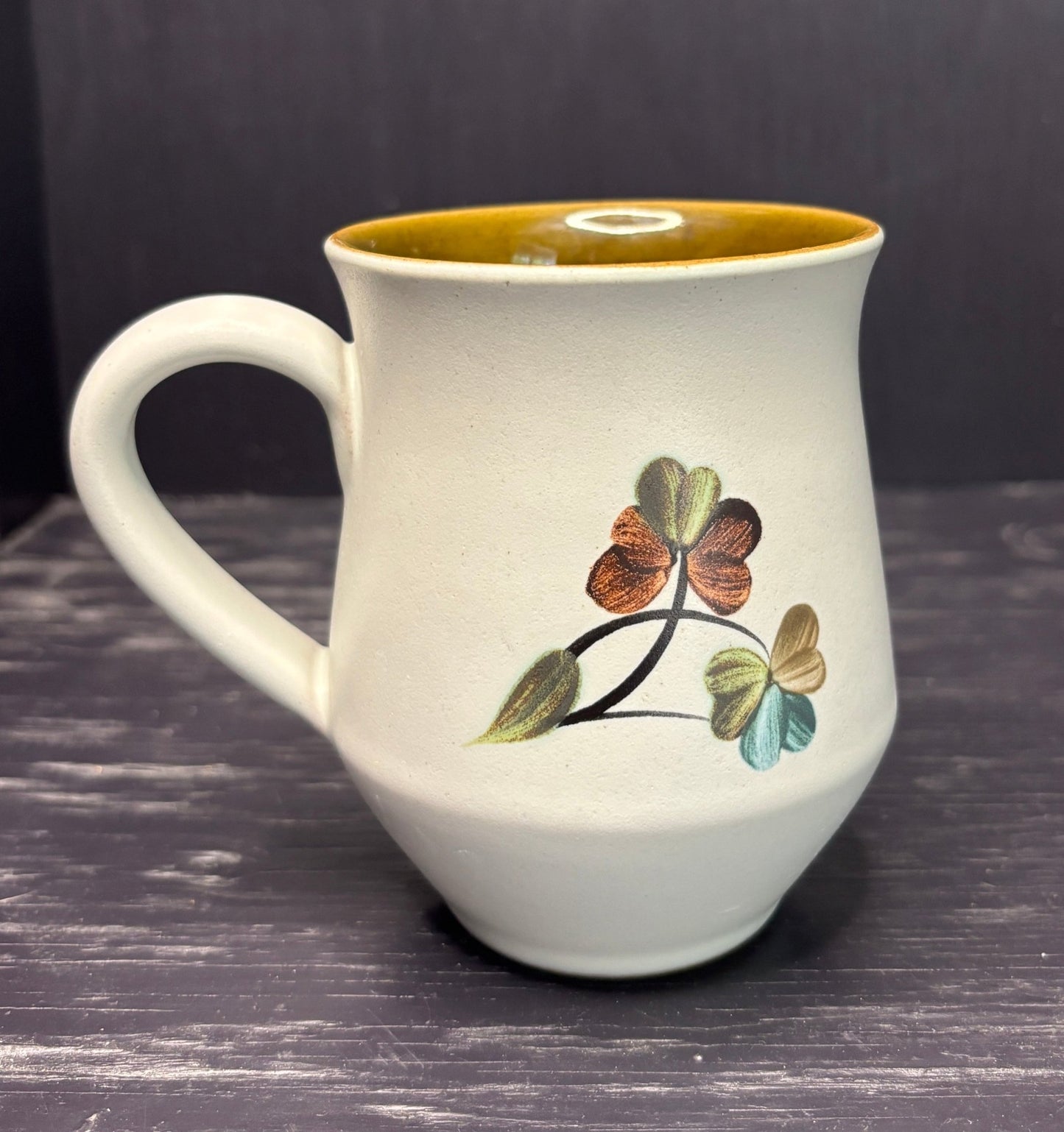 Denby Shamrock Coffee Mug with flower design and brown interior