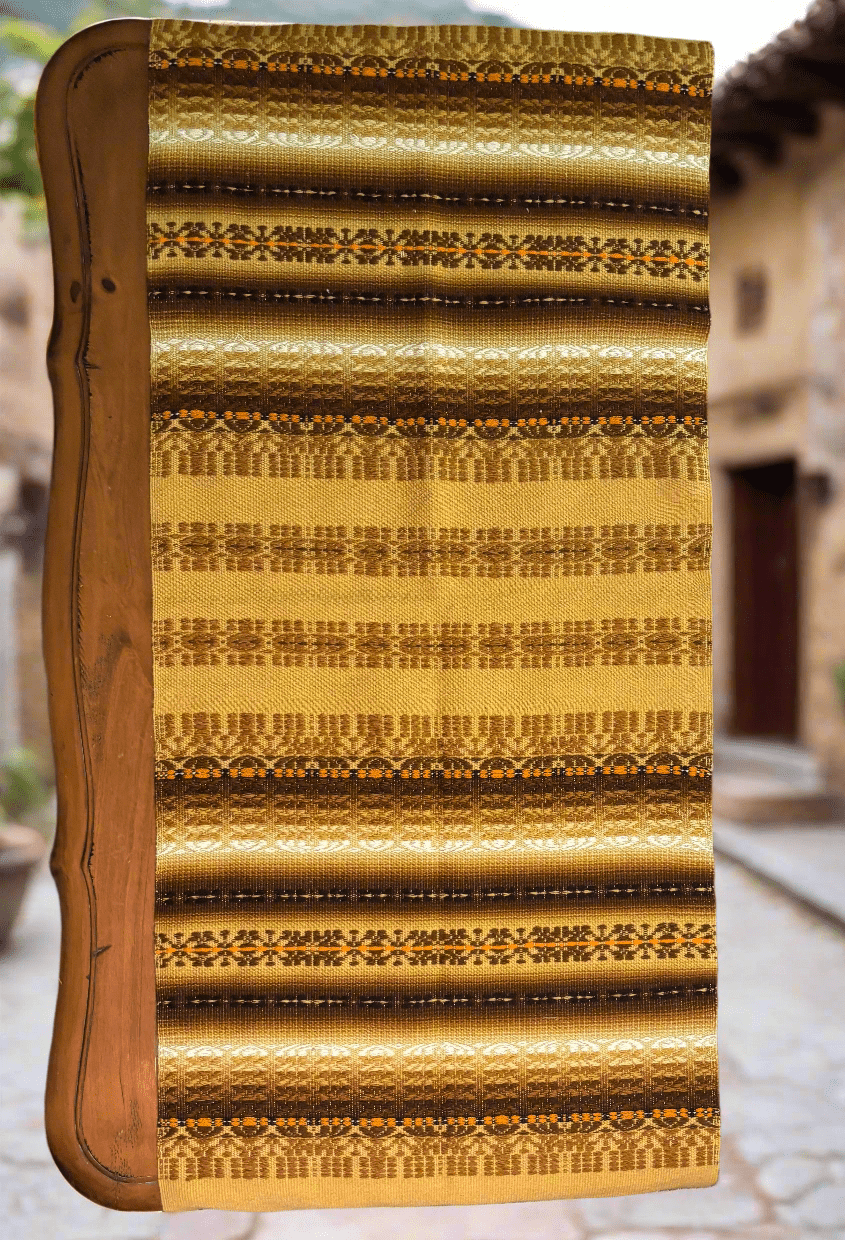 Patterned fabric with a wooden frame on a blurred background