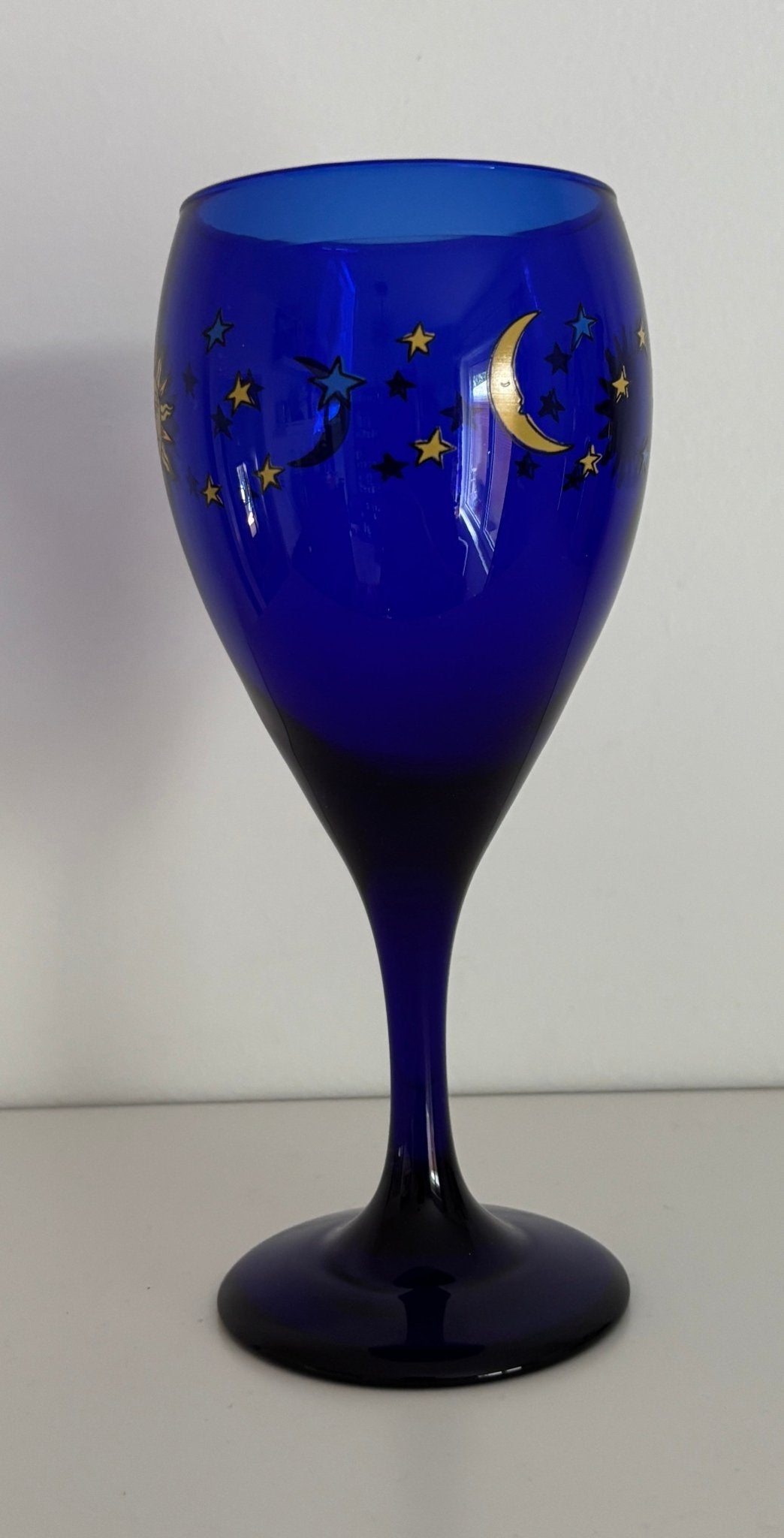 Libbey Blue Wine Glass with stars, moons and sun design.