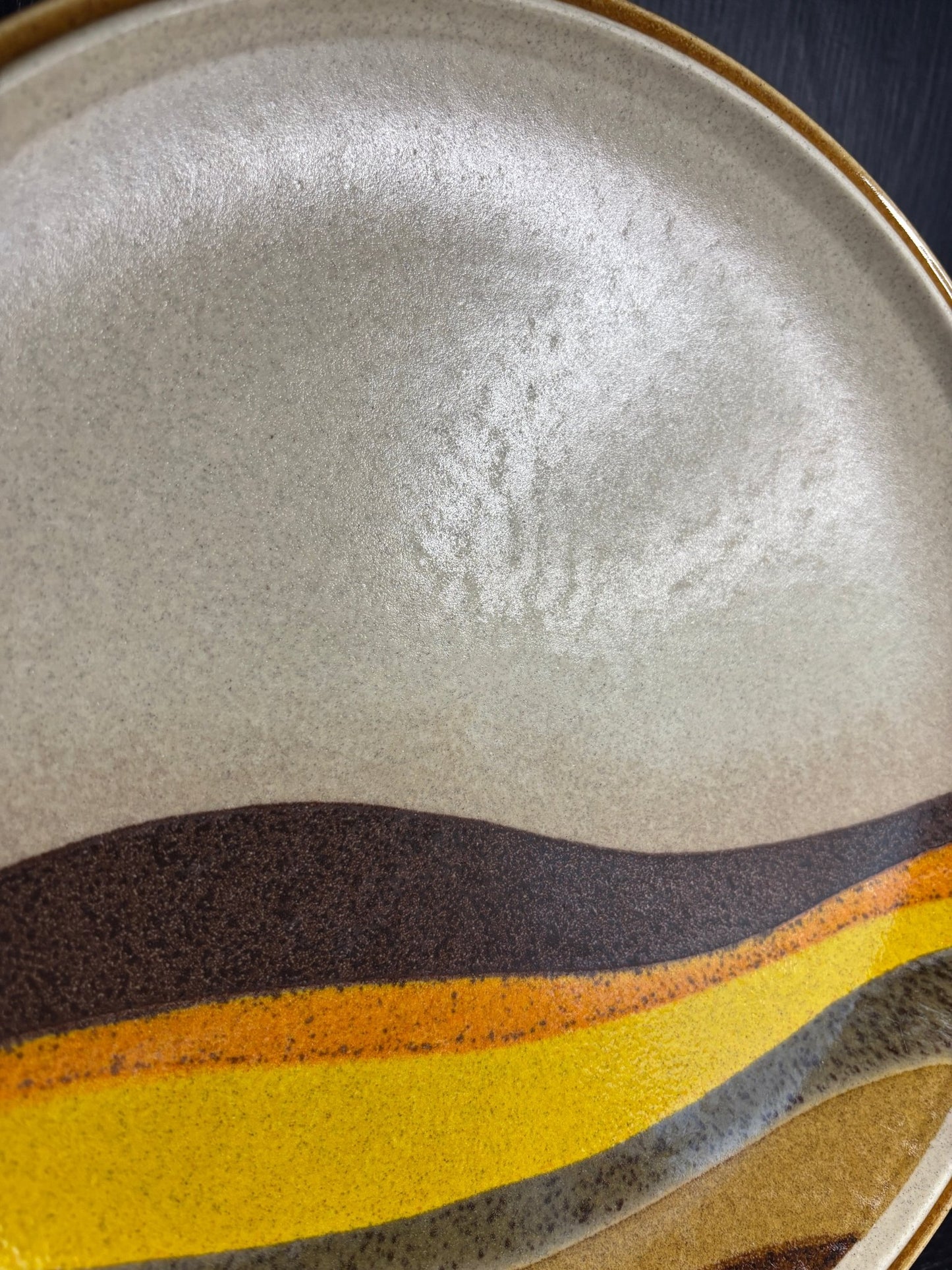 Mikasa Desert Waves Dinner Plate with brown and orange wave pattern