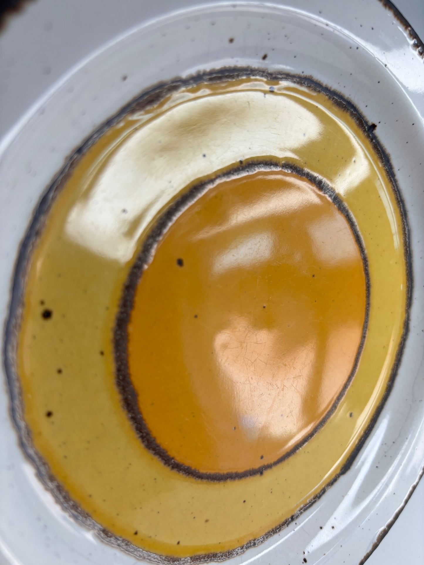 Close-up of a ceramic plate with concentric circle design