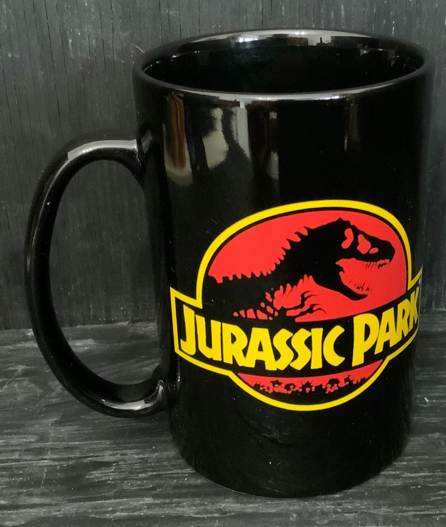 black Jurassic Park Coffee Mug with Jurassic park logo