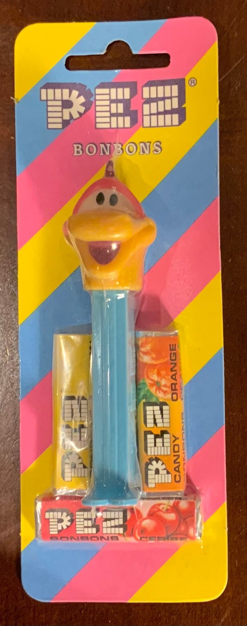 Vintage He Saur Pez a Saur Pez Dispenser new on the original striped card