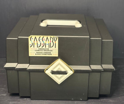 Green cosmetic organizer with a gold label on a dark background