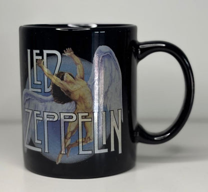 Black mug with Led Zeppelin logo and angelic design on a white background