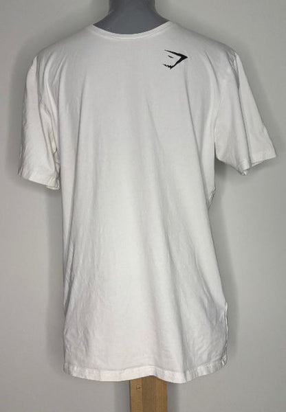 White t-shirt with a black logo on a gray background