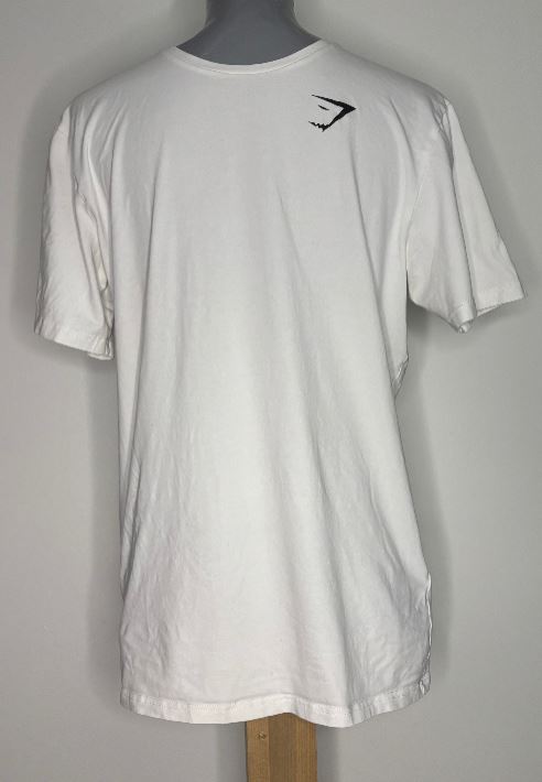 White t-shirt with a black logo on a gray background