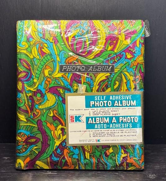 Colorful photo album with a vintage design on a dark background