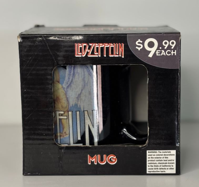 Packaged mug with Led Zeppelin branding and price tag.