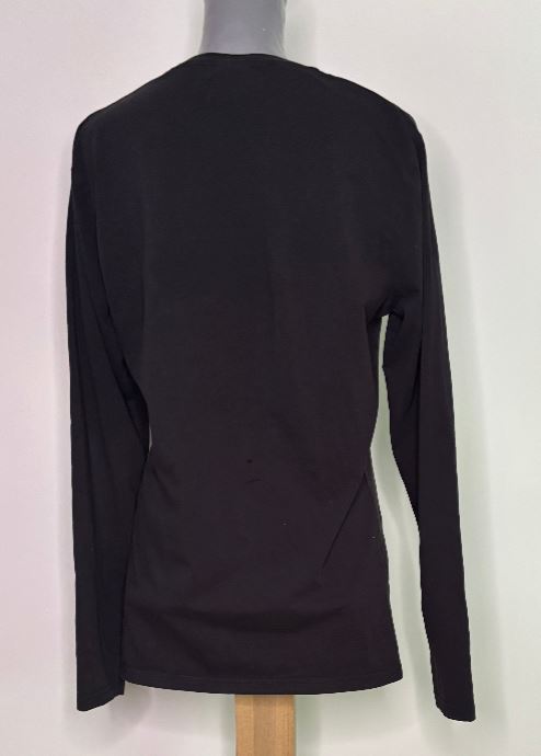 Black long-sleeve top on a mannequin against a white background