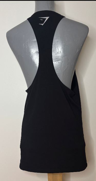 Black tank top on a mannequin with a visible brand logo against a white background