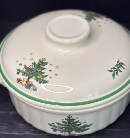 Ceramic dish with Christmas tree design on a dark background