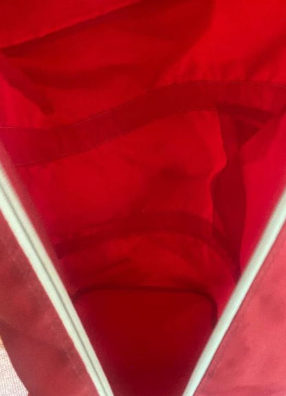 Close-up of red fabric with a textured pattern