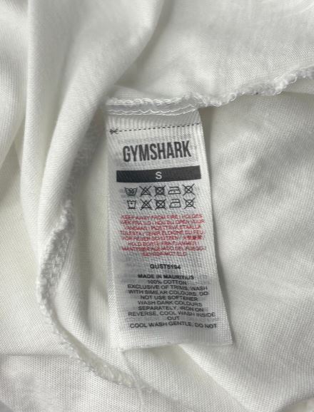 Gymshark label on a white garment