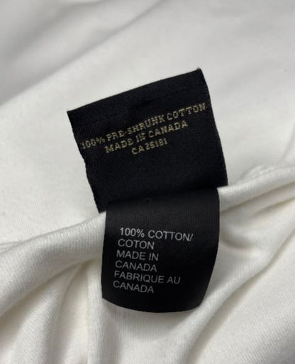 Clothing label on a white fabric background