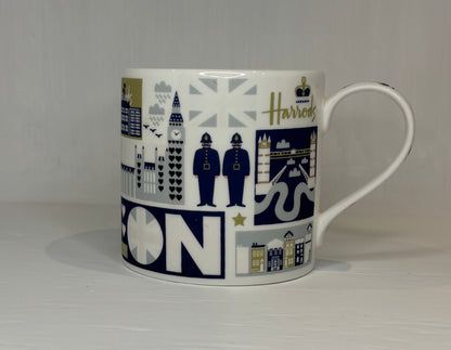 Mug with London-themed design on a white background
