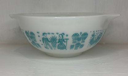 White bowl with blue pattern on a white background