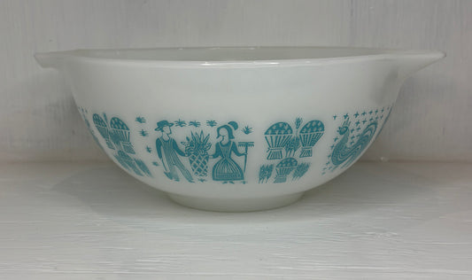 White bowl with blue pattern on a white background