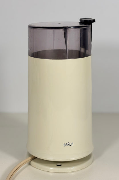 Vintage Braun coffee grinder on a white background