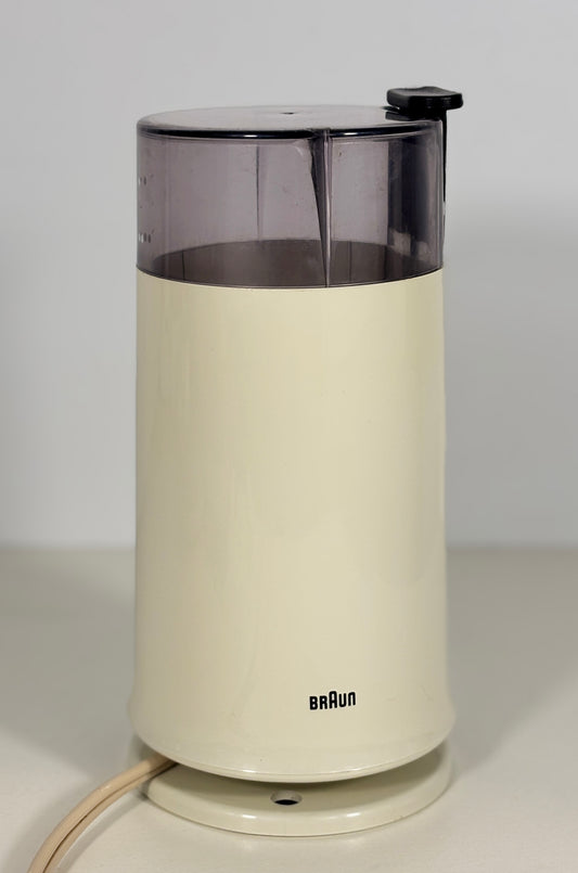 Vintage Braun coffee grinder on a white background