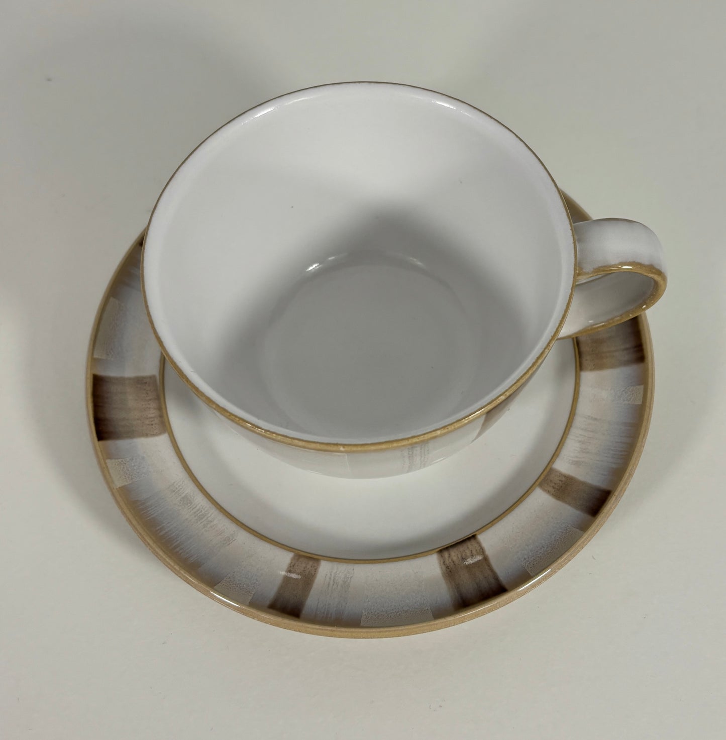 Denby Truffle teacup with layered glaze design
