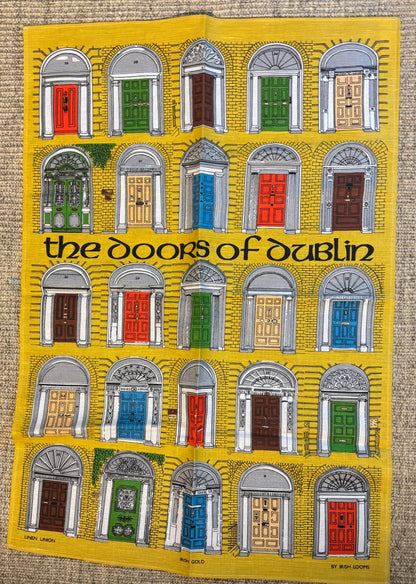 Poster of colorful doors on a yellow background with text 'the doors of dublin'.