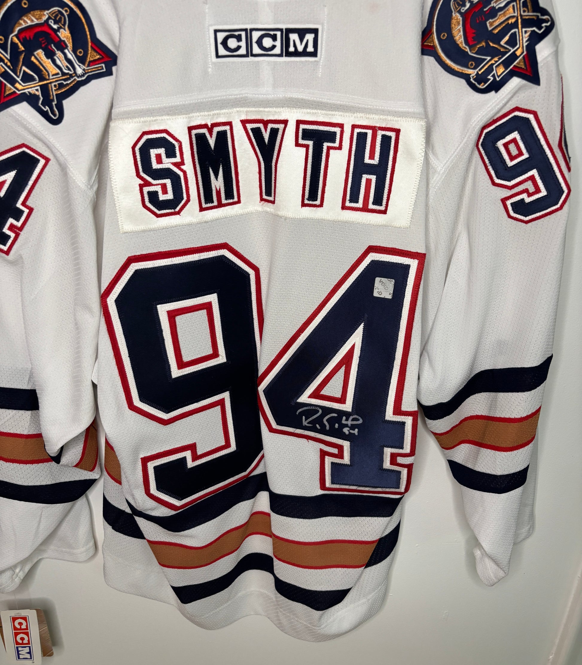 Hockey jersey with 'Smyth' and number '94' on a white background