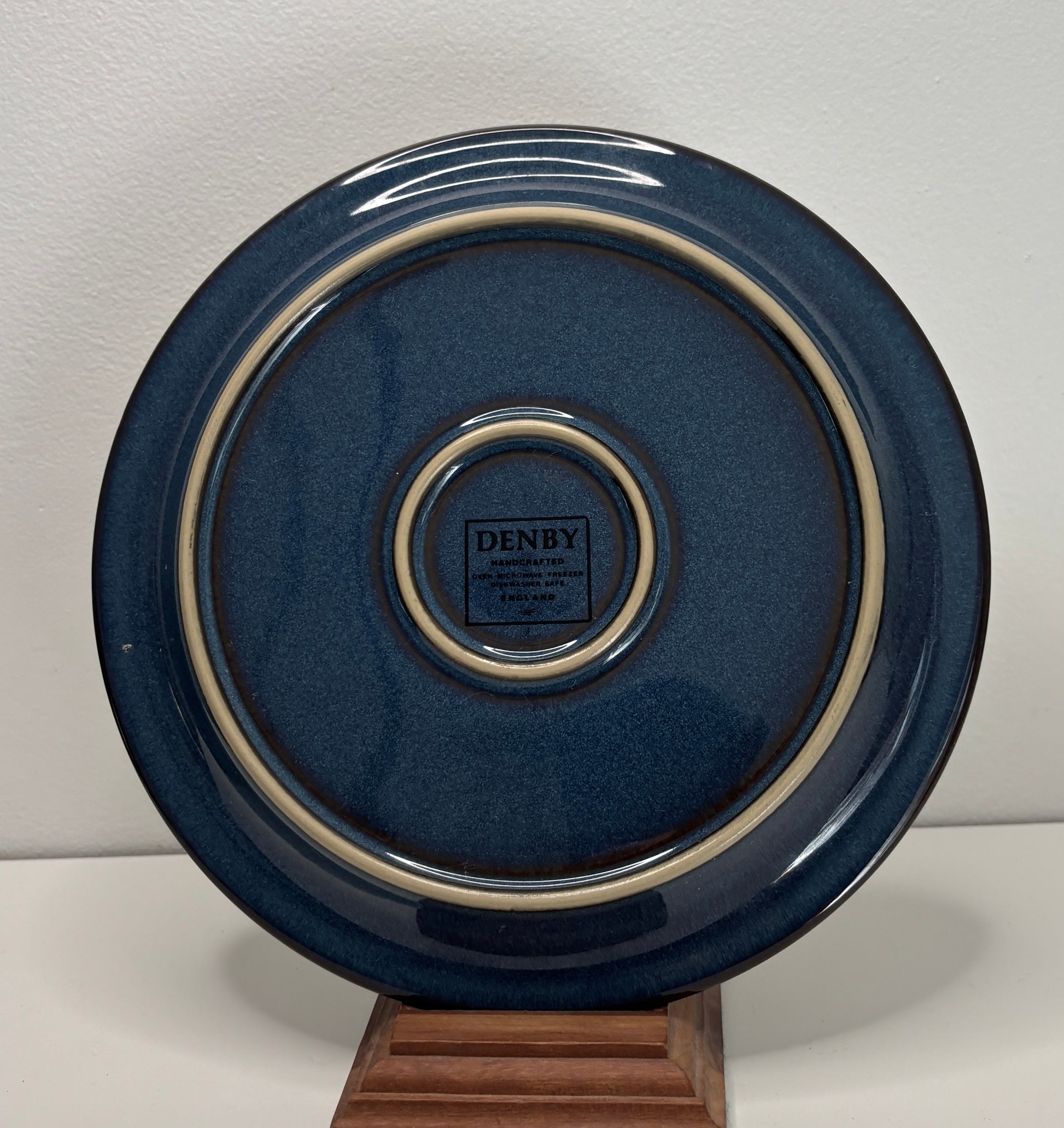 Blue ceramic plate with a visible Denby logo on a white background Denby Boston Spa Salad Plates
