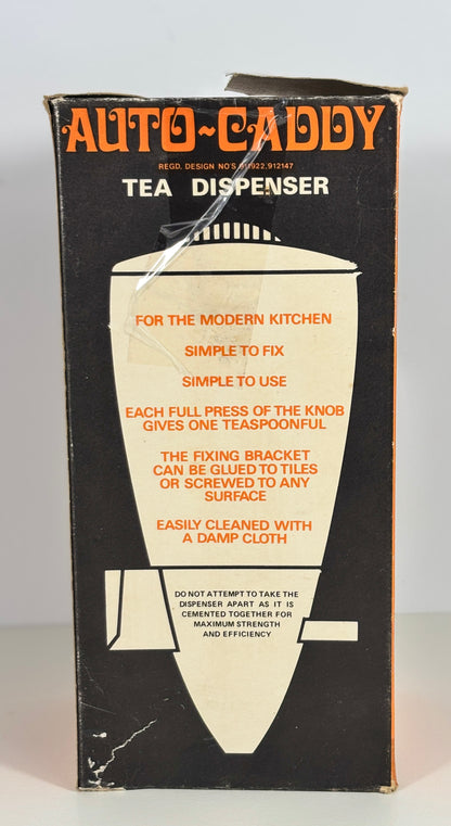 Box for Auto-Caddy tea dispenser with black and orange design