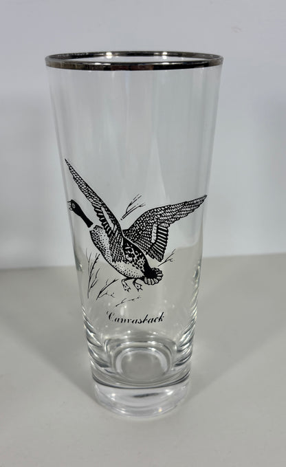 Clear glass with black bird illustration and 'Canvasback' text on a white background