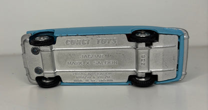 Model car toy with 'Corgi Toys' branding on a gray background