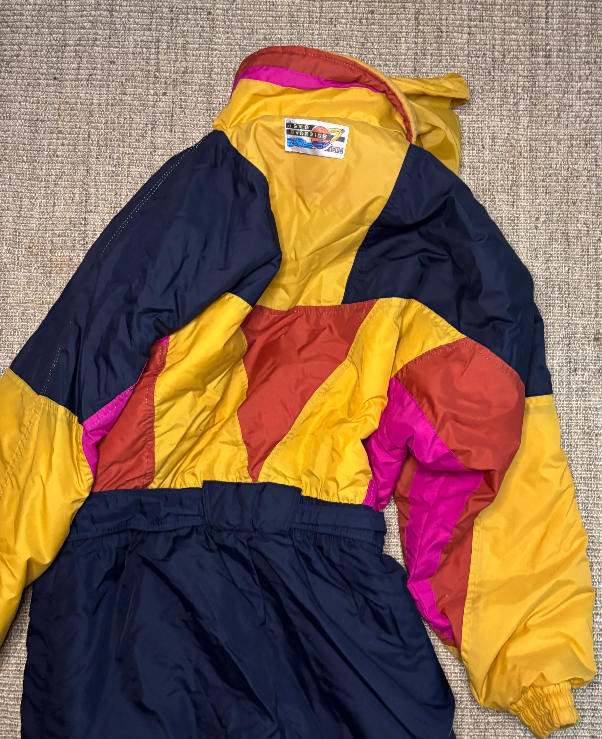 Colorful jacket with a pattern on a textured surface