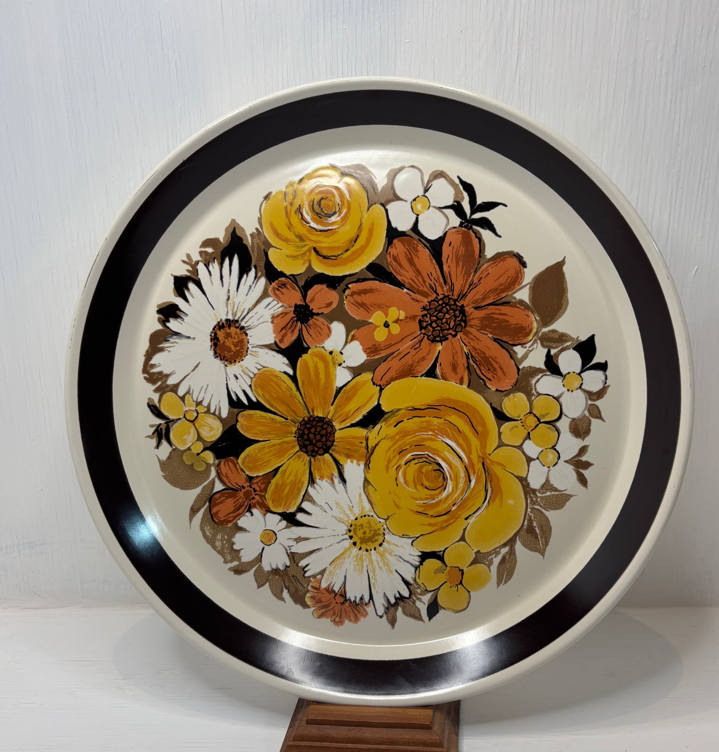 Decorative plate with floral design on a white background