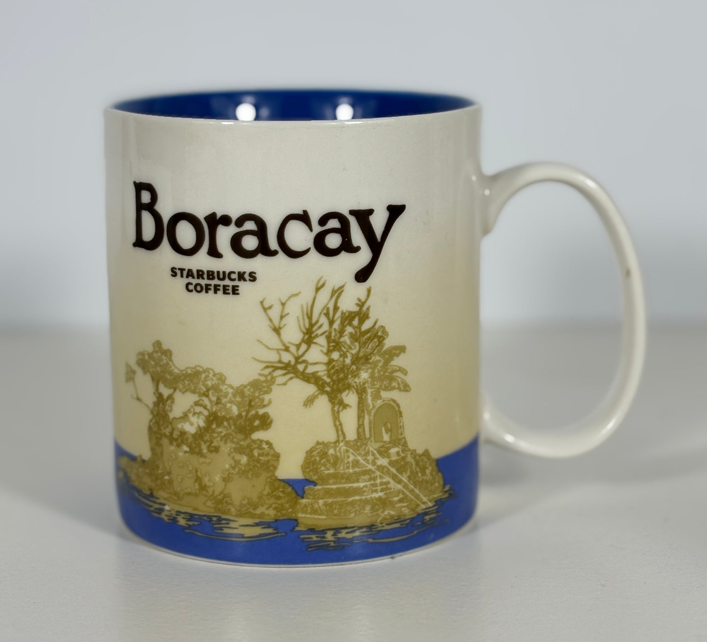 Starbucks Coffee Boracay mug with blue interior and base on a white background