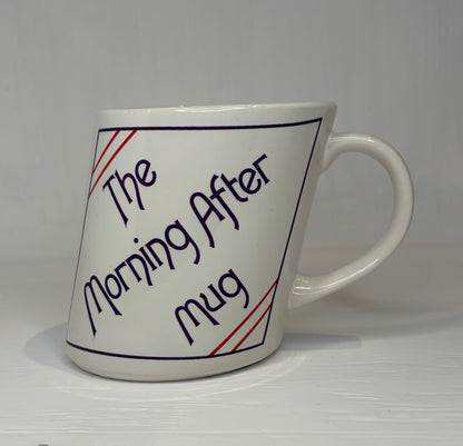 White mug with text 'The Morning After Mug' on a white background