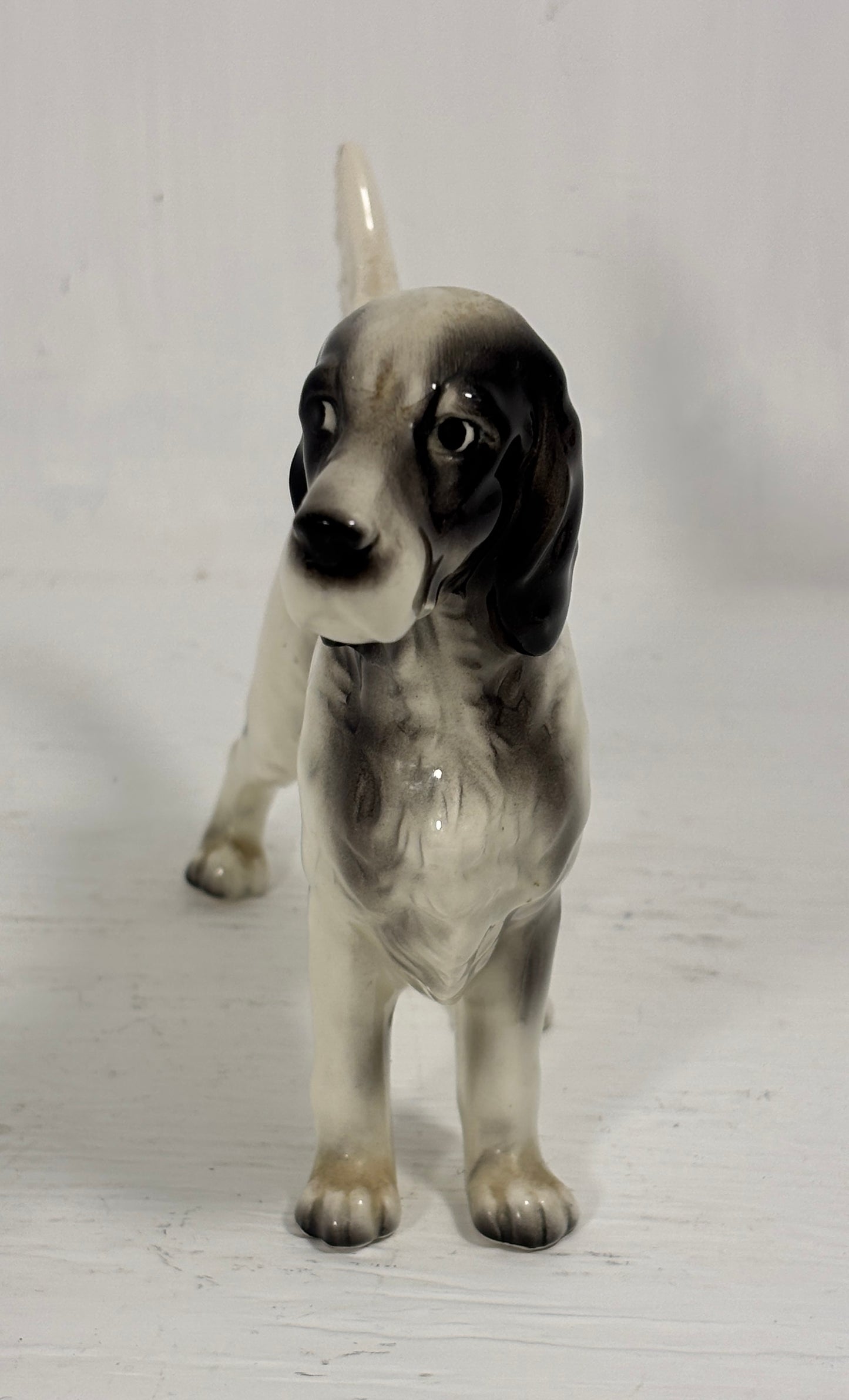 Dog figurine on a white background