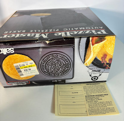 Saltz Pizzelle Master automatic pizzelle baker box shown with a price sticker on the front and a limited warranty card in front, on a white surface.