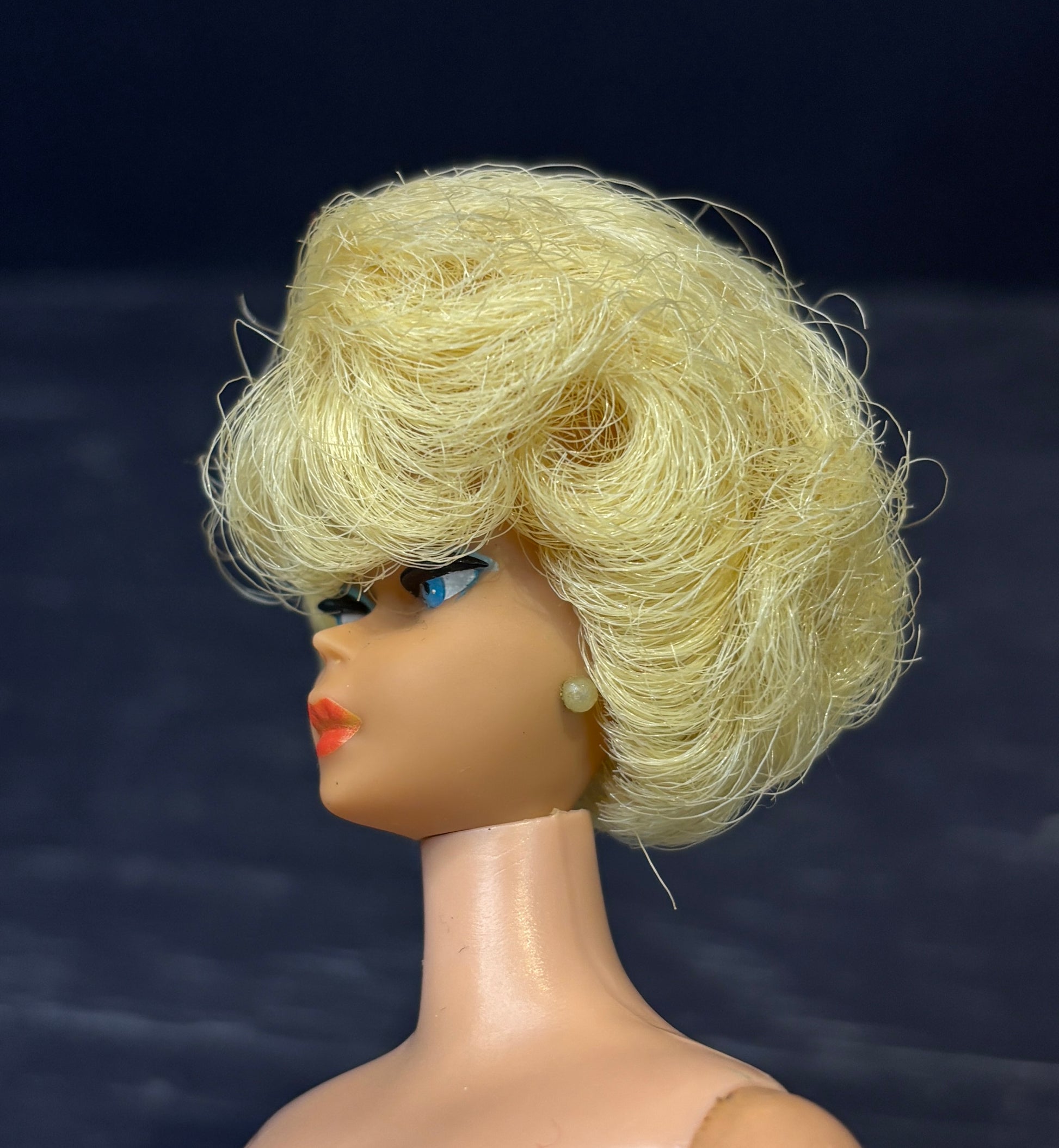 blonde old barbie head