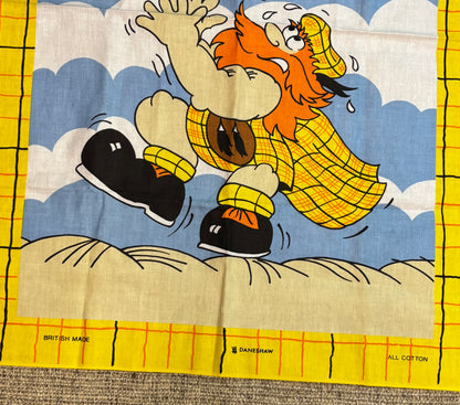Cartoon character in a yellow raincoat on a fabric background with 'British Made' and 'Danebrow' branding.
